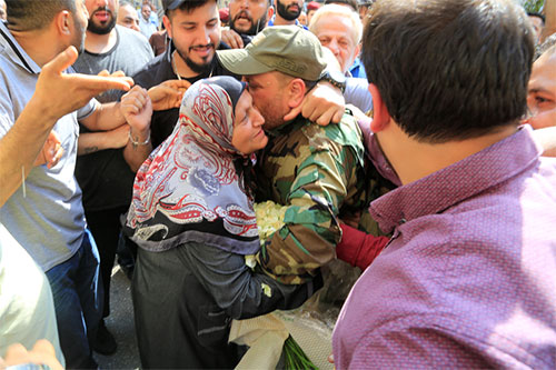 Combatientes de Hezbolá regresan a casa tras cumplir la misión en Fua y Kefraya